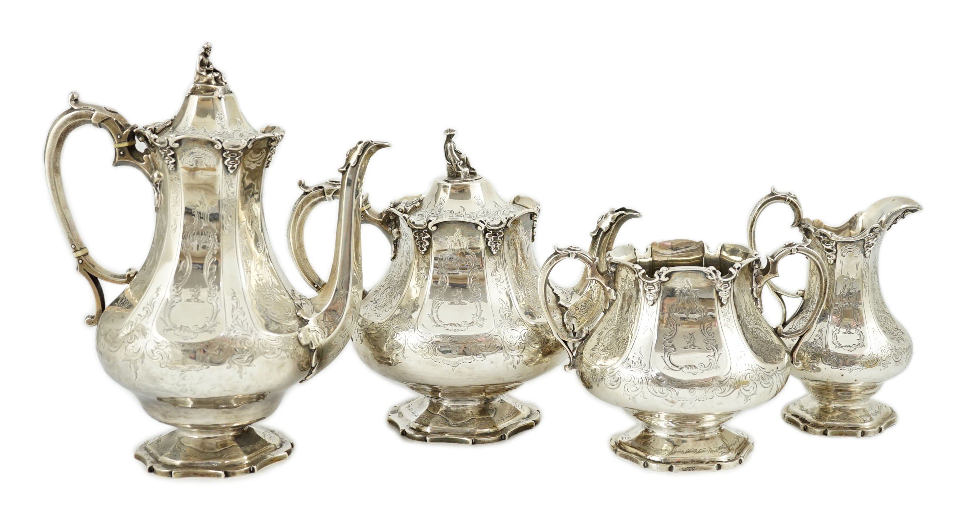 A Victorian silver pedestal four piece tea and coffee service by Robert Harper